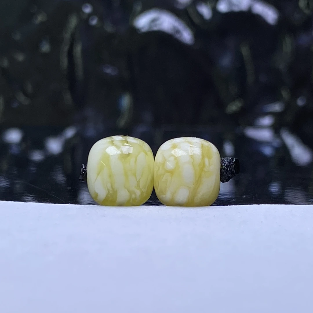 琥珀蜜蜡金瓷白千层虎皮纹老型对珠7.2mm