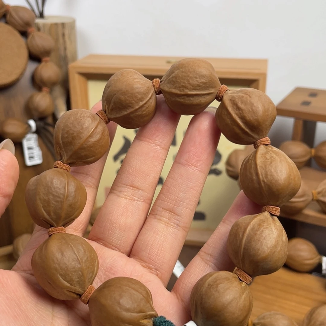 陈***纹手串/手链橄榄核23*25梅林铁核