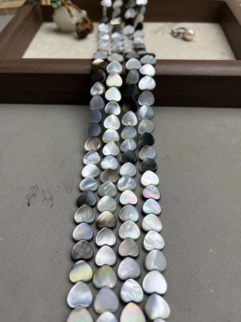 天然10mm左右海水黑蝶贝爱心散珠半成品长度37cm左右可DIY当配珠