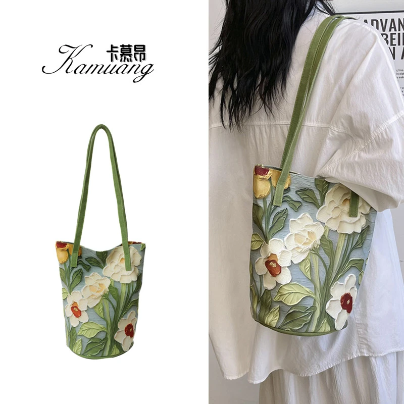 2025新款原创油画花卉百搭小众休闲水桶包单肩包书店帆布包包女包