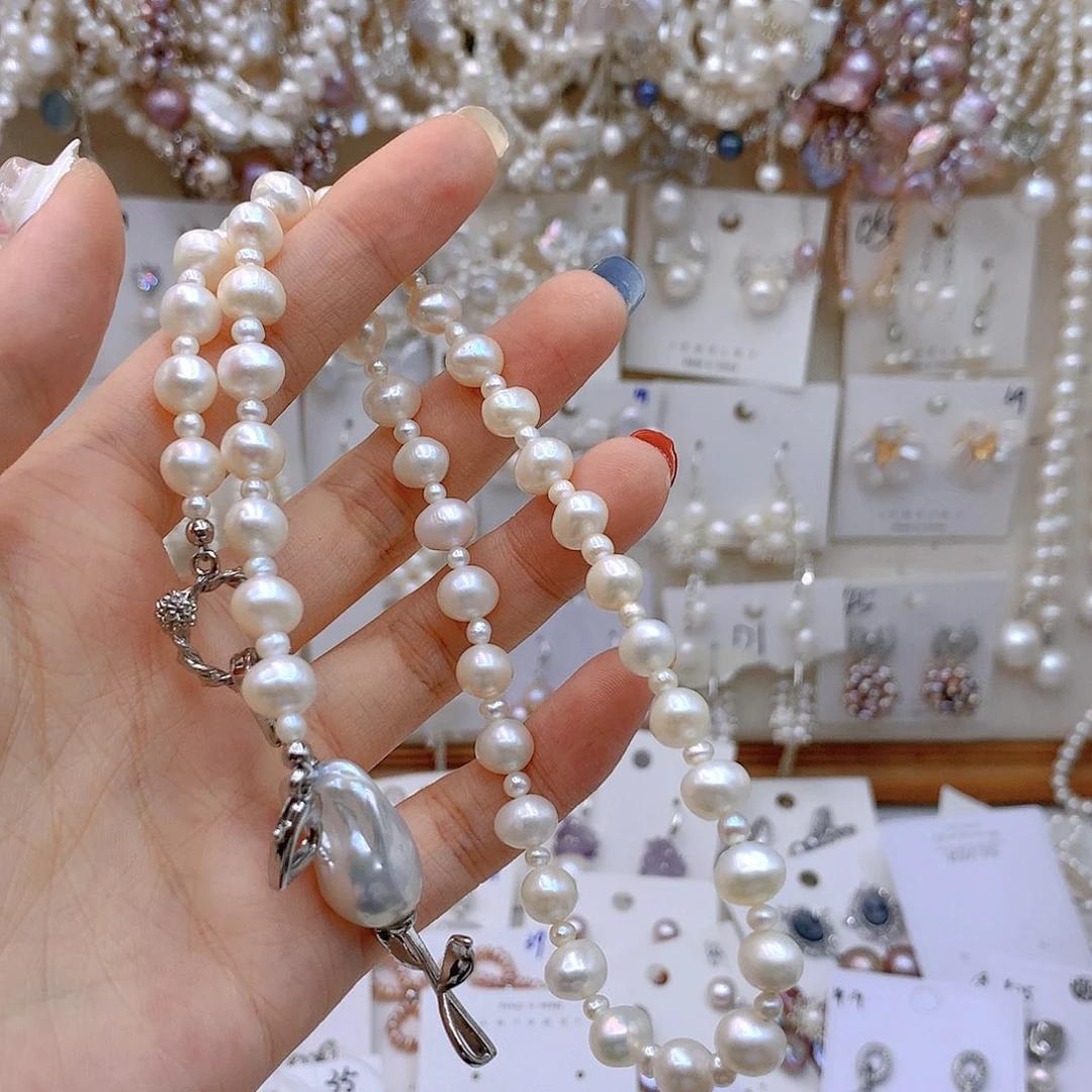 银S925镶嵌淡水珍珠发饰洛*