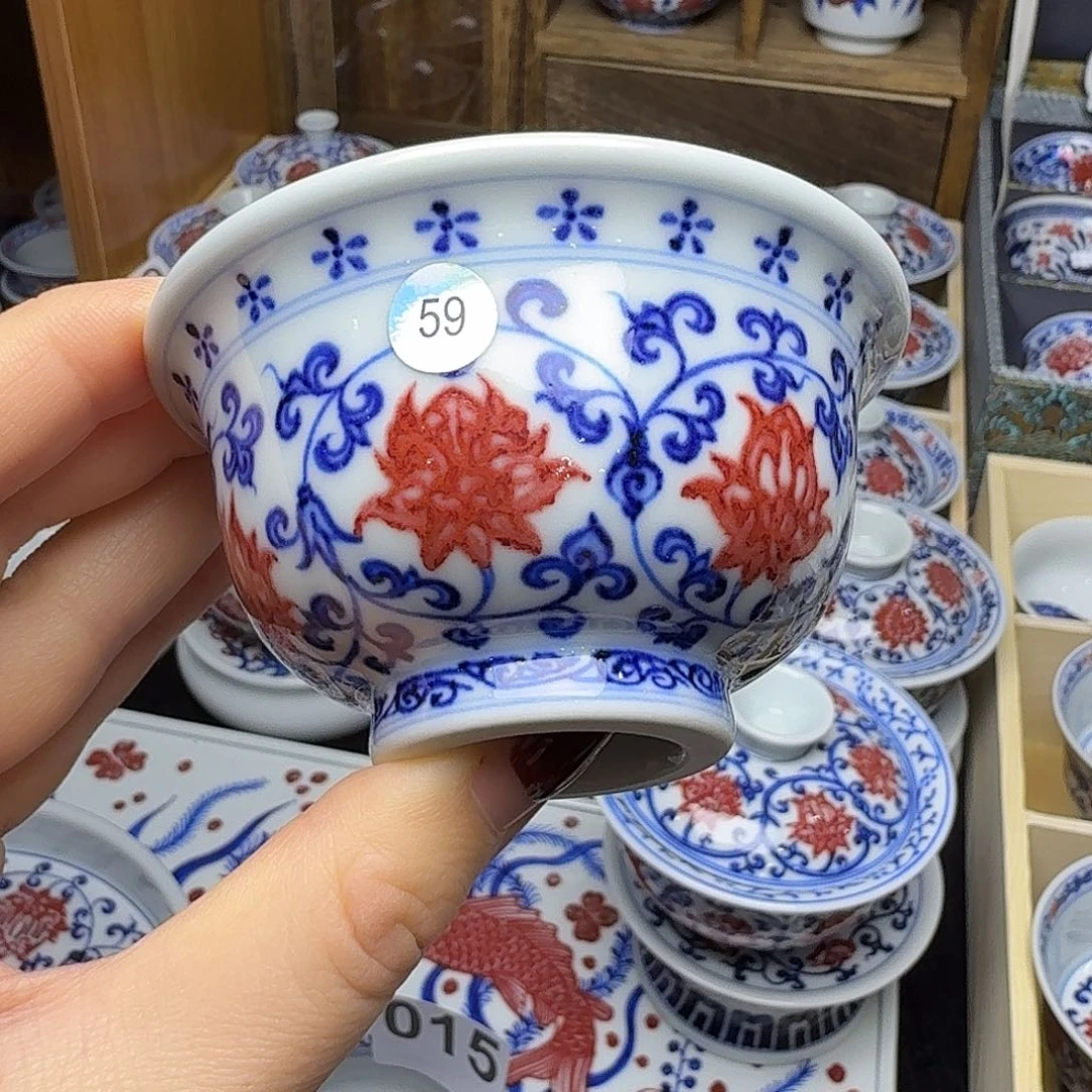 有***呲青花釉里红八花压手