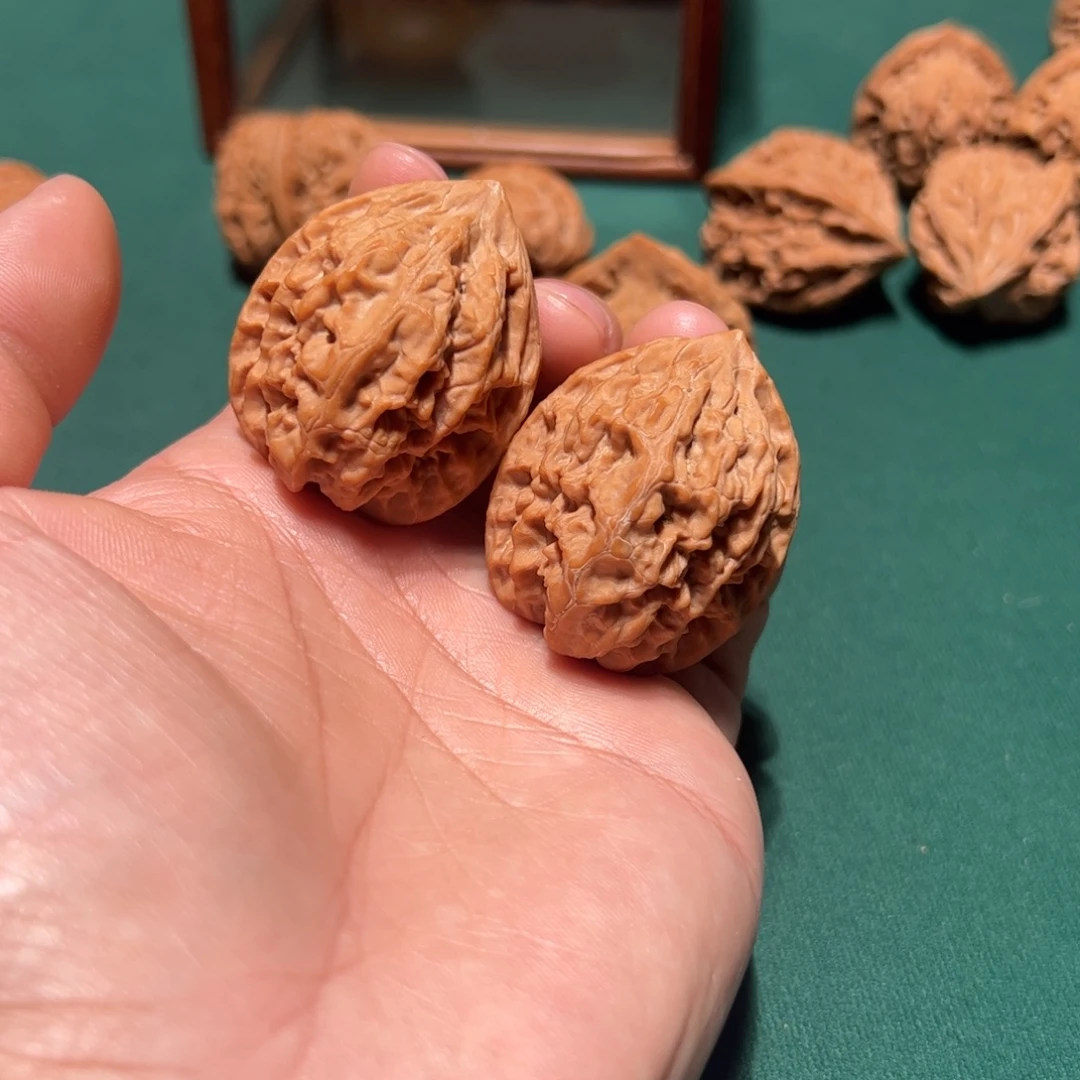 假***作文玩核桃把件野生鸡心35全品