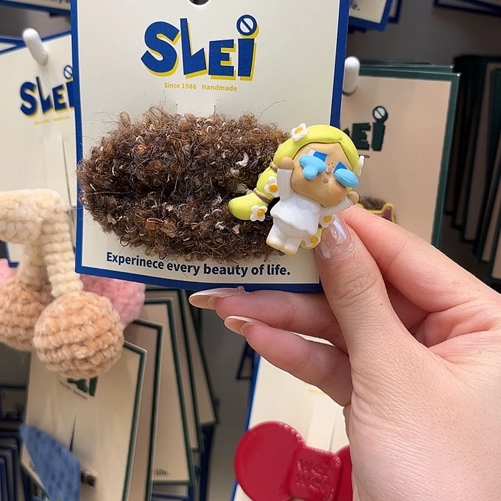 布艺铁合金哭娃拜拜夹