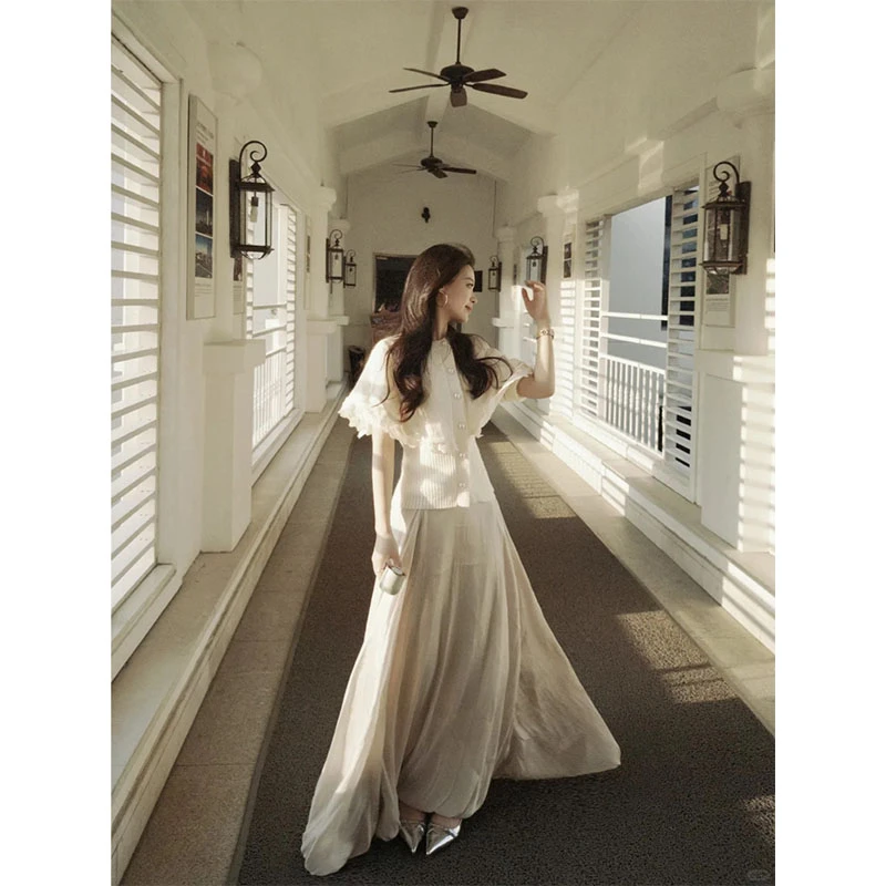 韩系设计感白色假两件长袖针织衫女2025新款巨好看的上衣显瘦长裙