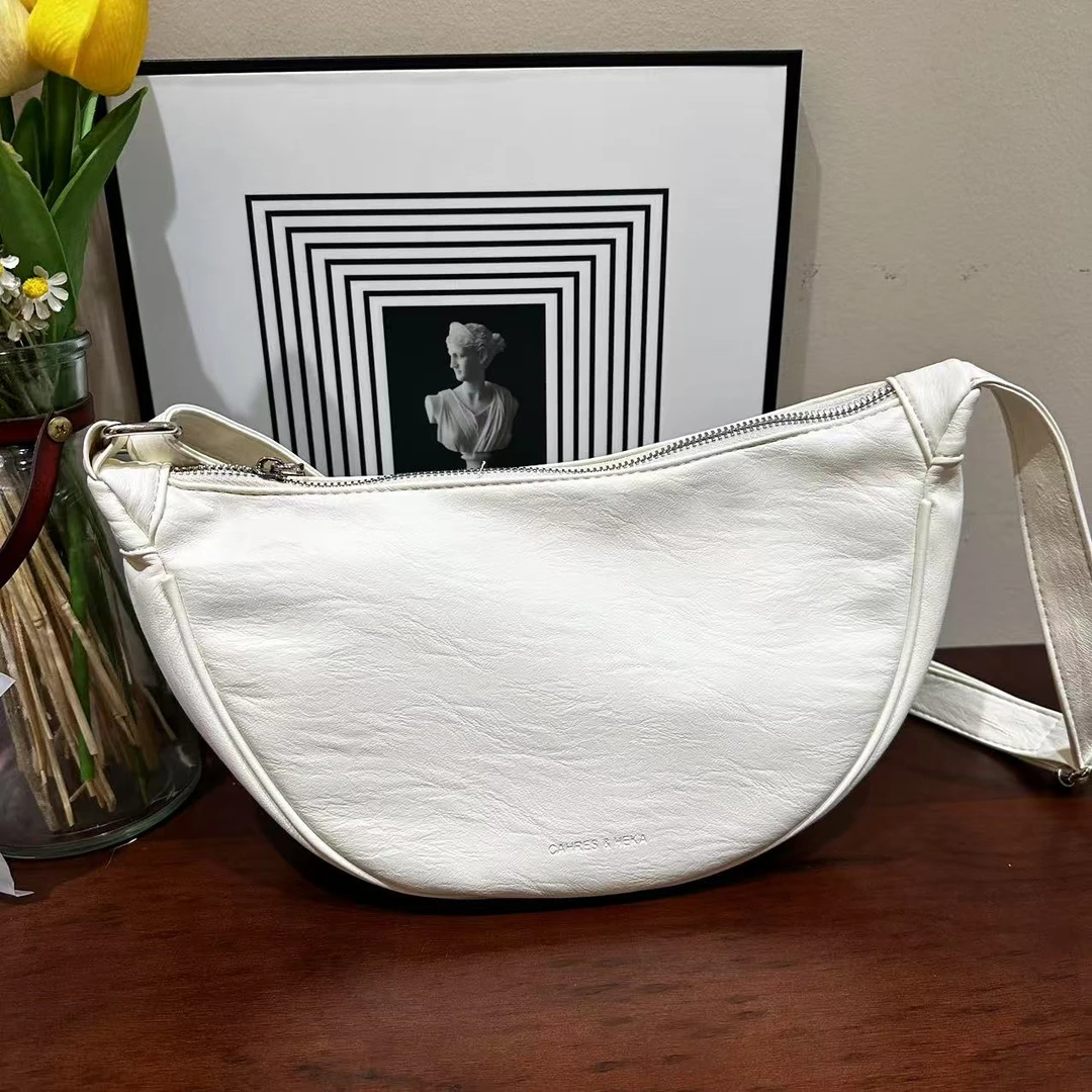 包包女斜挎包2025新款早春款大容量小众设计高级感复古单肩饺子包