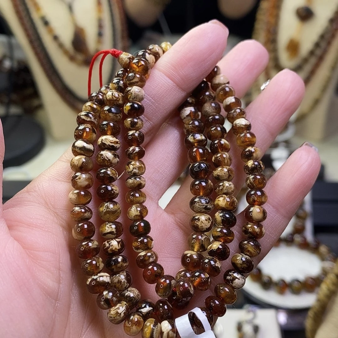 琥珀未镶嵌裸石116珠血底溶洞6