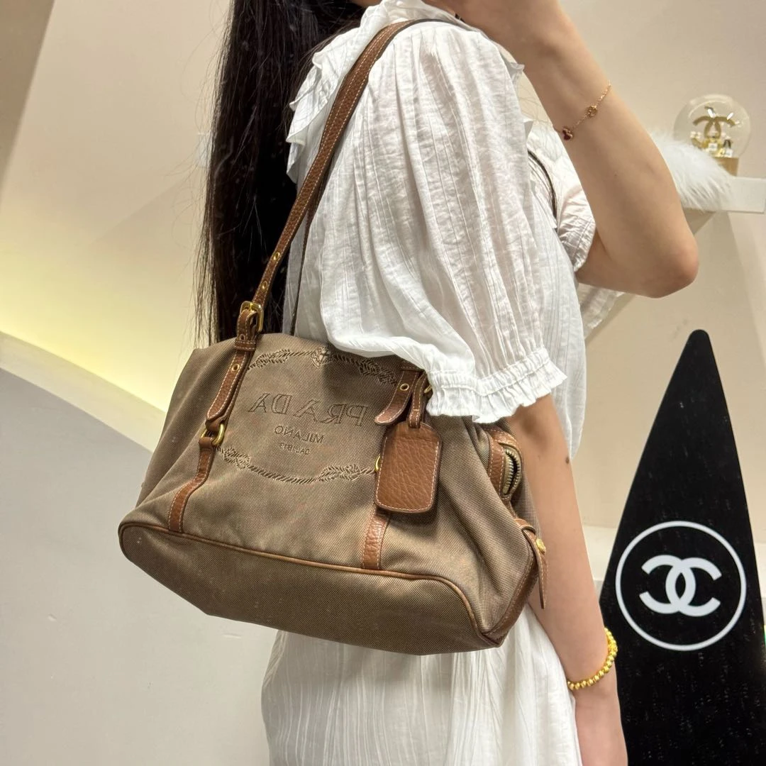 95新 Prada/普拉达 棕色帆布单肩包/8548