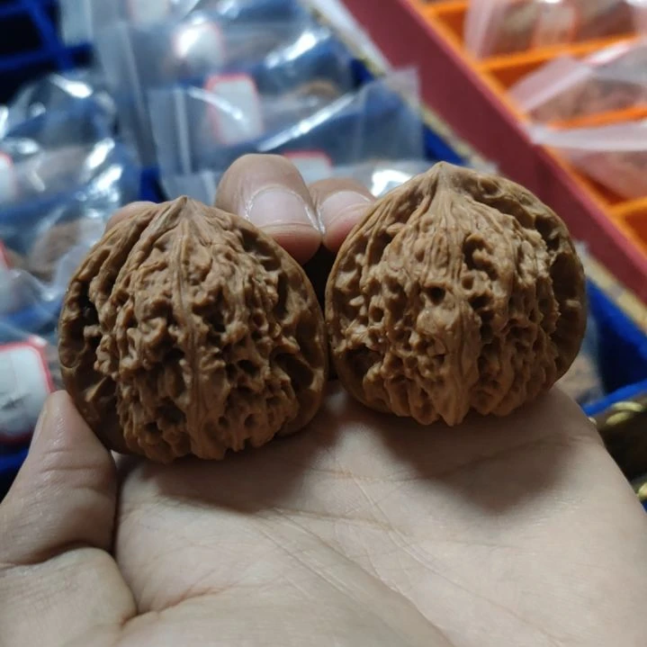 你***色文玩核桃把件南将石42