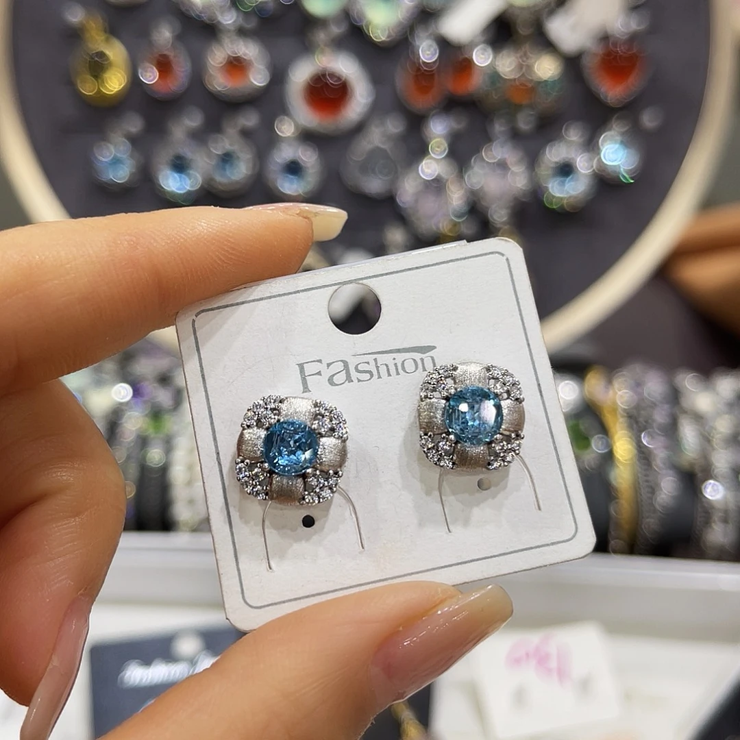 懒***觉银S925镶嵌托帕石耳饰