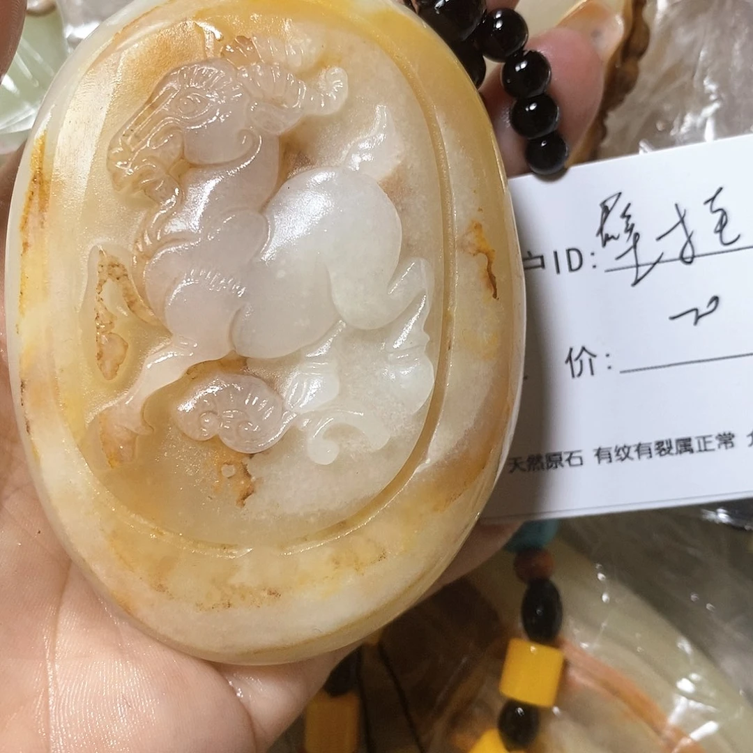 石材壁****心古青石手把件