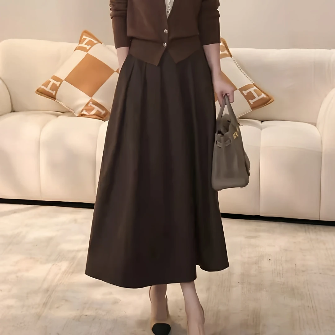 a字半身裙百褶裙女2025秋冬新款梨型身材遮胯口袋中长款a字裙伞裙