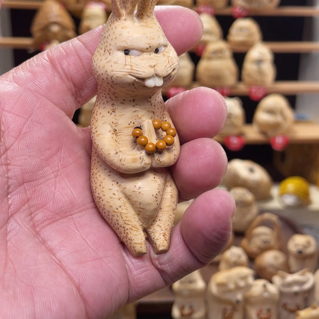 喵***喵竹竹根雕兔子手把件