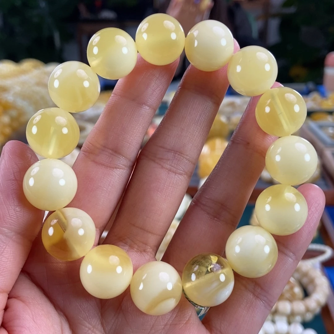 琥珀未镶嵌珠宝奇石15同料金白荧光圆珠30.68