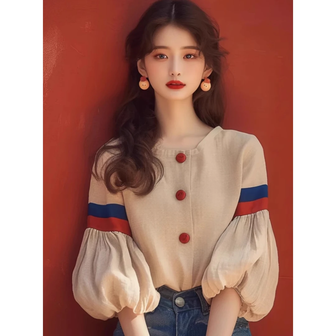 2197 早秋新款法式小众设计感独特洋气减龄杏色灯笼袖衬衫女