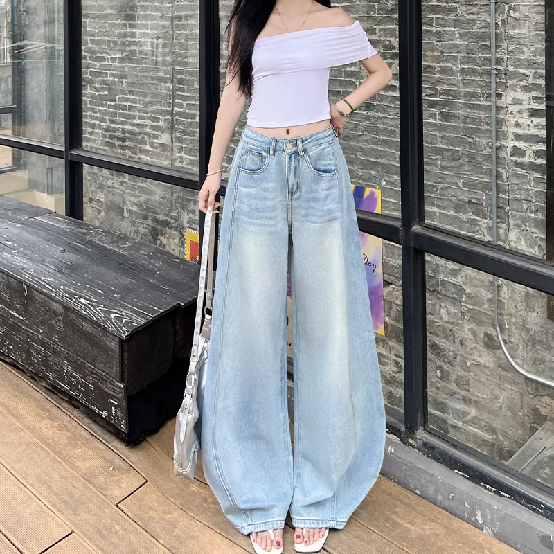 水洗浅蓝弯刀牛仔裤女2025年秋季新款宽松显瘦拖地百搭慵懒阔腿裤