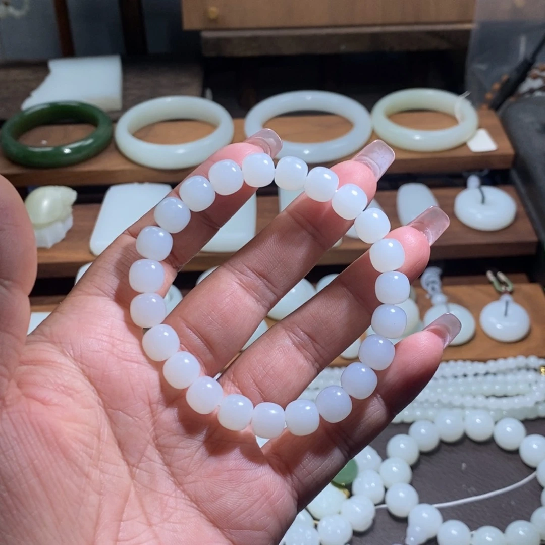 未镶嵌手链和田玉（糖玉）李**?