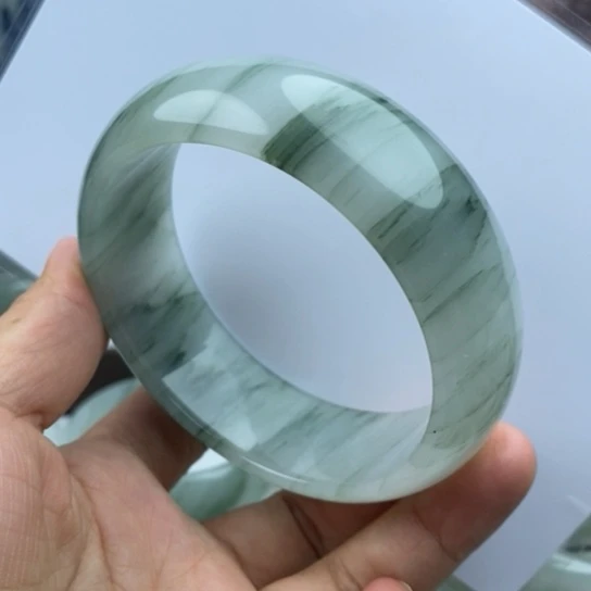 拉***。未镶嵌手镯石英质玉（金丝玉）