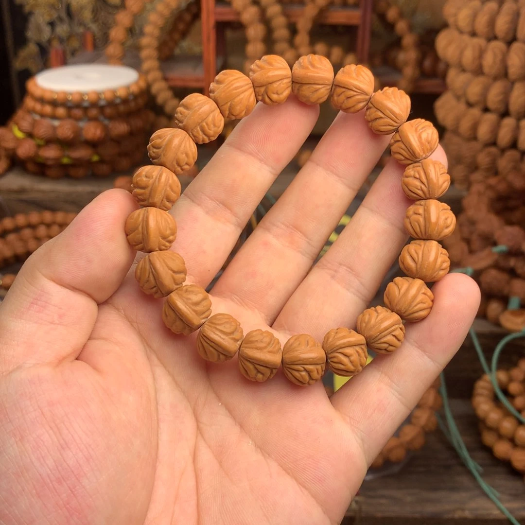 桃核吊坠14金豆 龙纹桃核