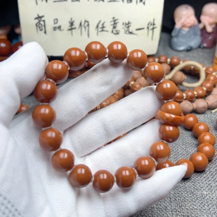 陌***然橄榄核手串1.2全品小孔