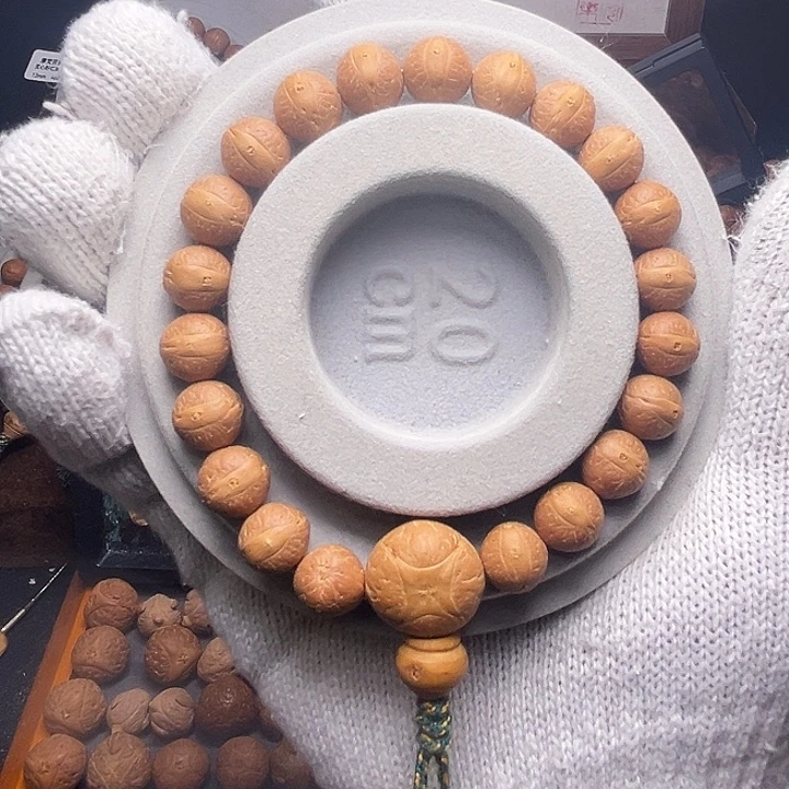 手串凤眼菩提11mm实心粉红玉化皮