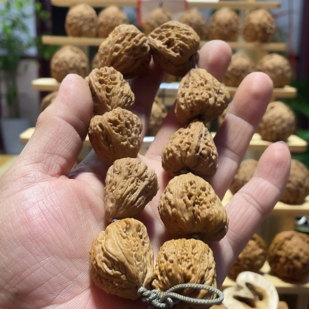 林***一桃核吊坠南将石手串