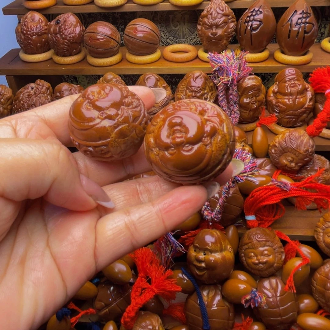 杨***楠吊坠橄榄核横财迷