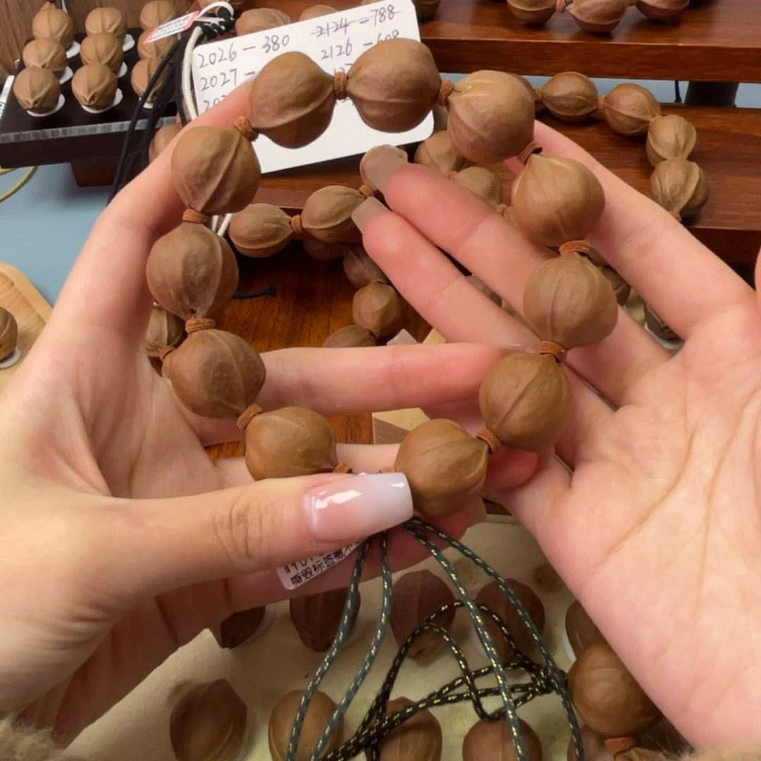 梁***.橄榄核手串/手链2224梅林铁核