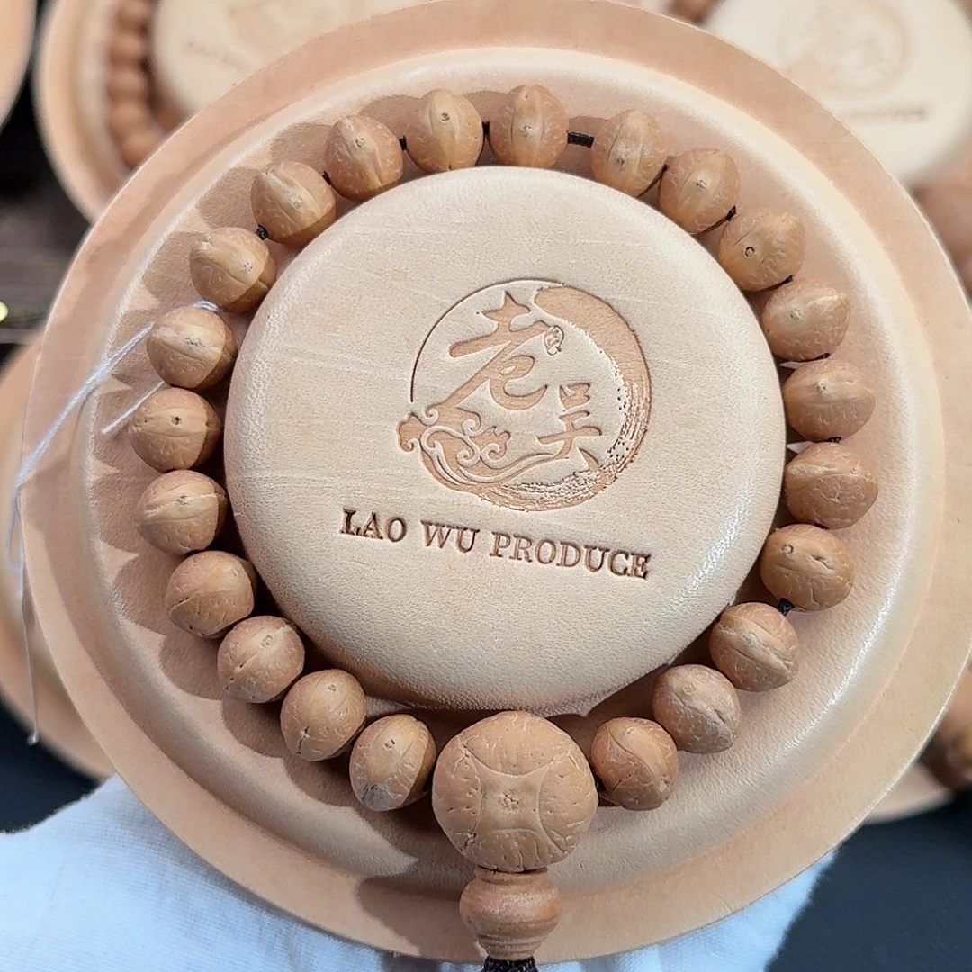 吊坠凤眼菩提头货11mm飞碟