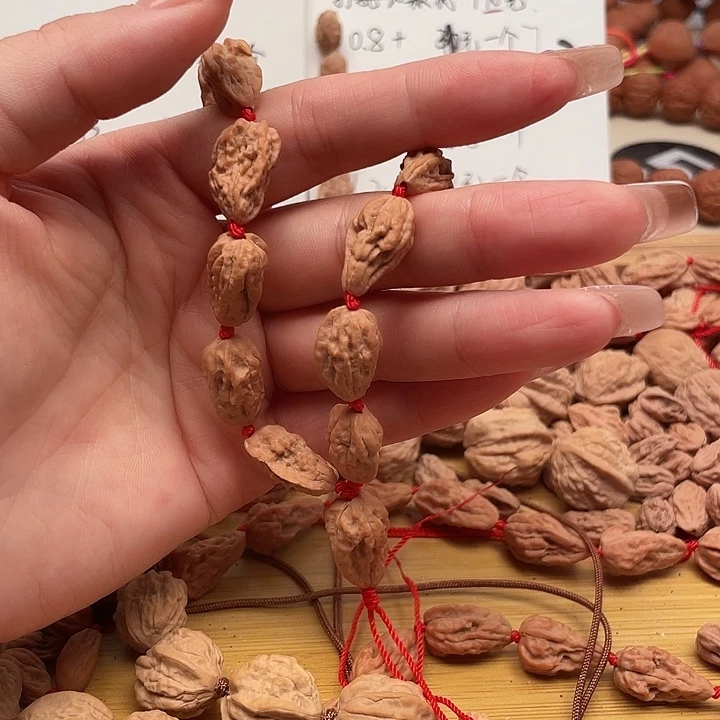 奈***笑文玩核桃吊坠异形