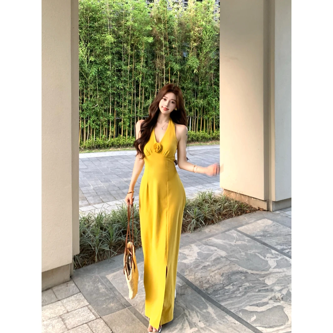 黄色花朵v领露背挂脖连衣裙女夏季修身开叉裙子纯欲收腰包臀长裙