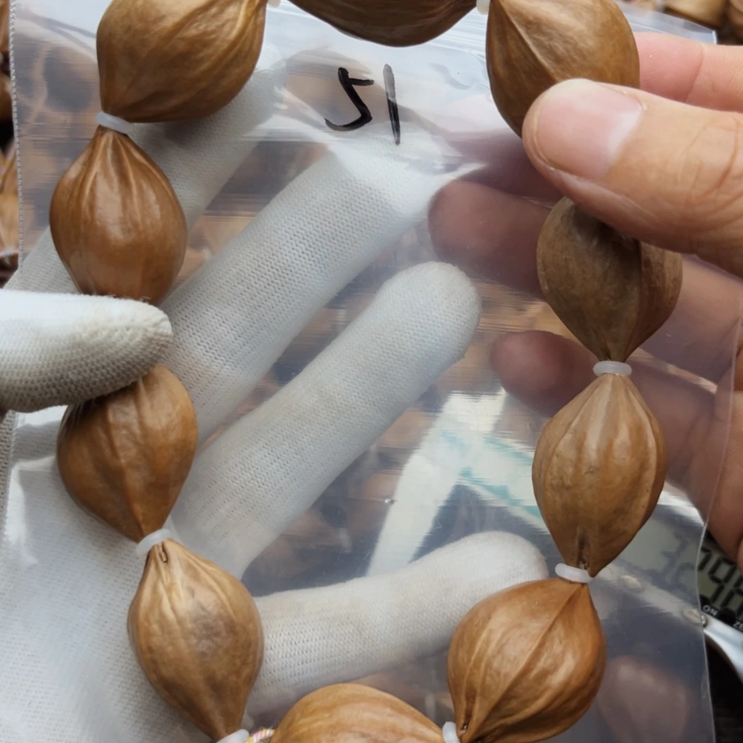 橄榄核手串/手链51号，2.3×3.2四花