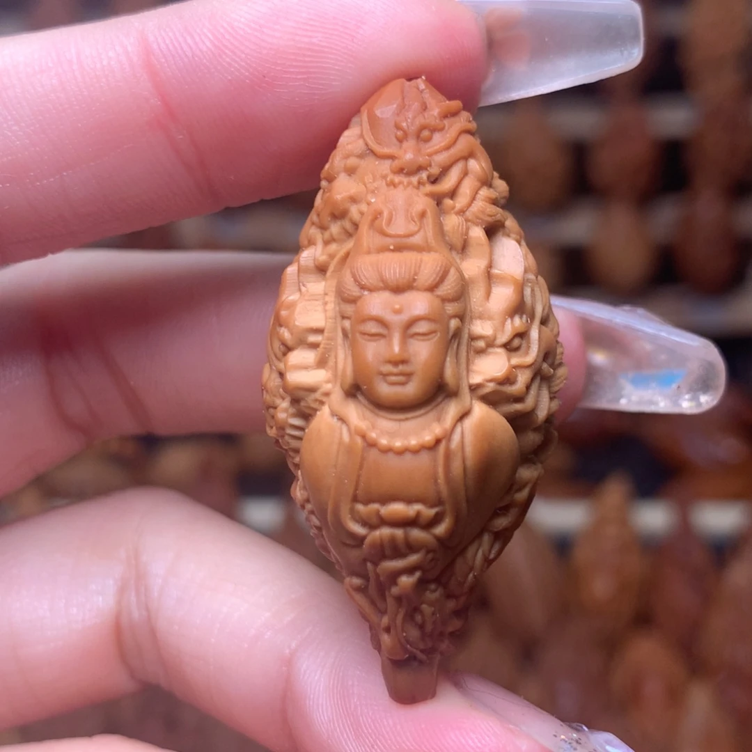 把件橄榄核九龙观音