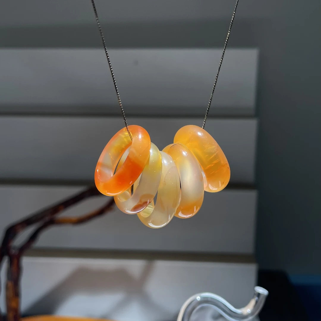 日照金山 高荧光马料玉髓戒圈   KT24111404