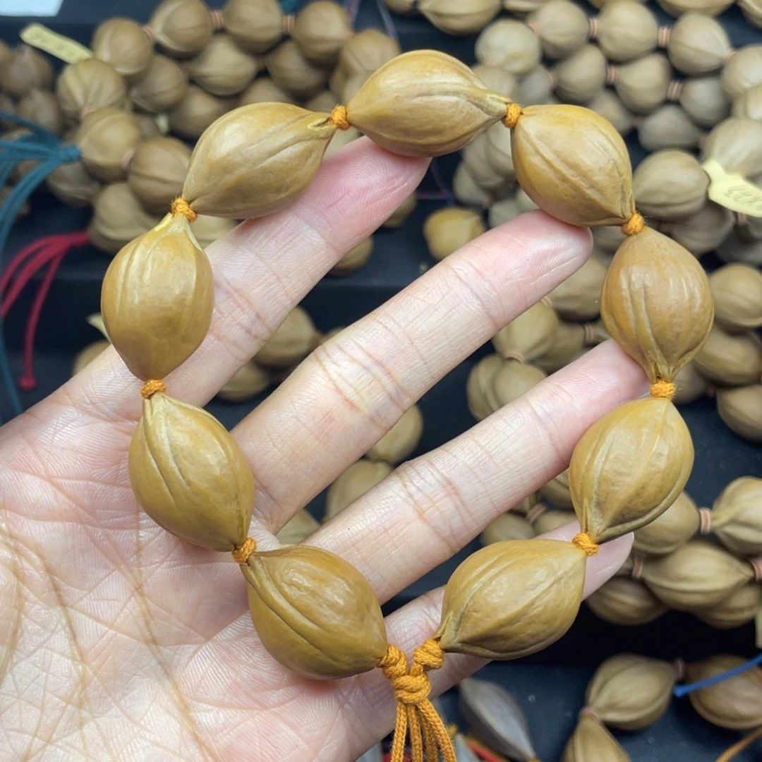 002橄榄核三花17*26