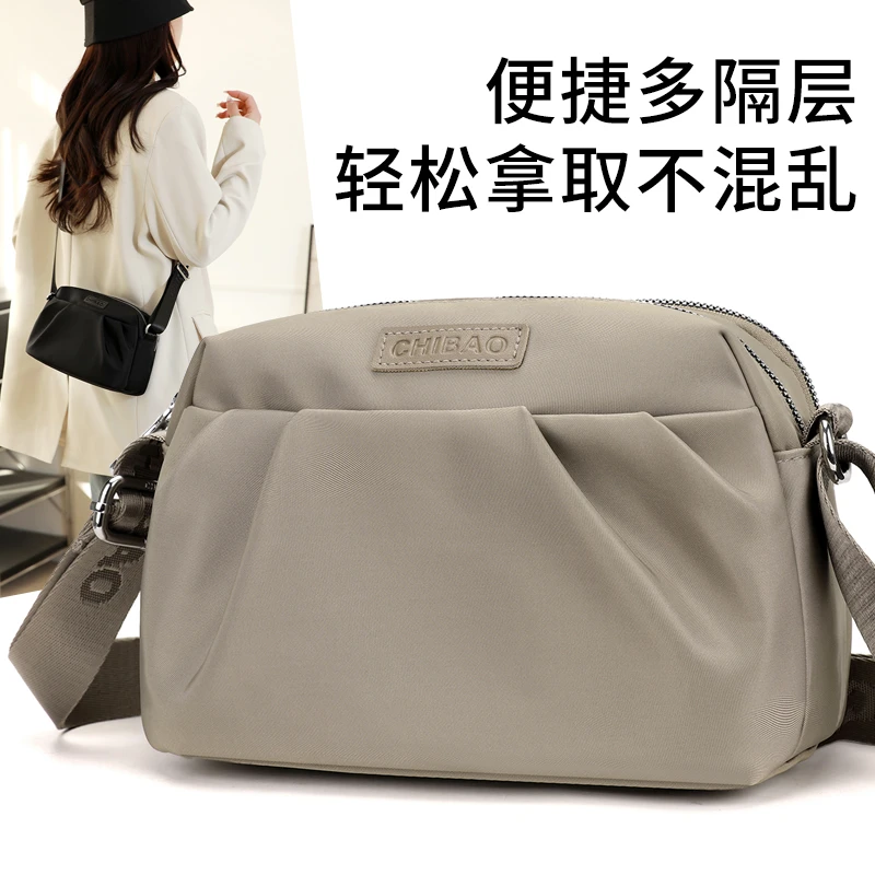 女百搭暗袋斜挎包单肩斜挎帆布包斜跨包肩包时尚新款休闲小包包