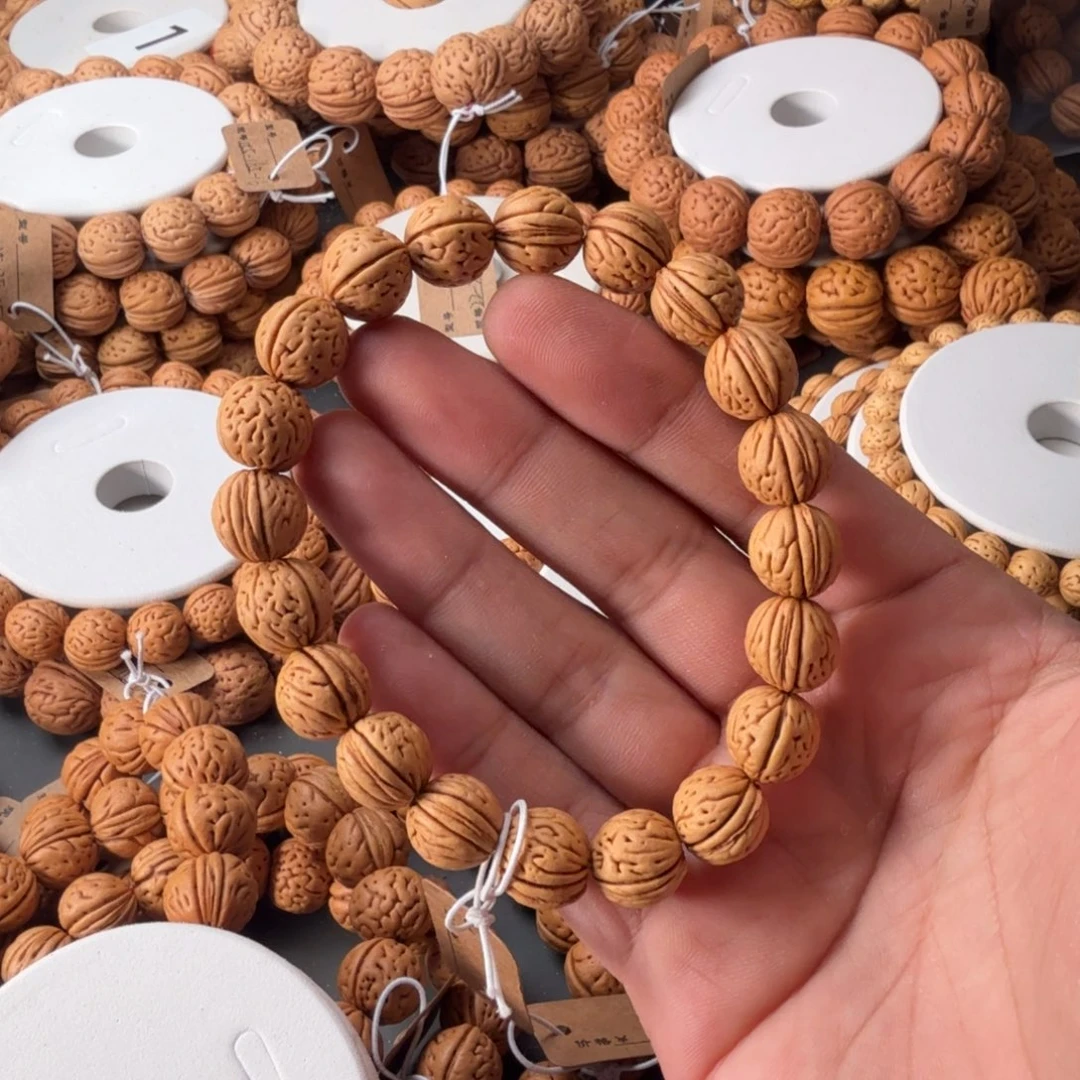 桃核手串?**乐125玉麒麟桃核