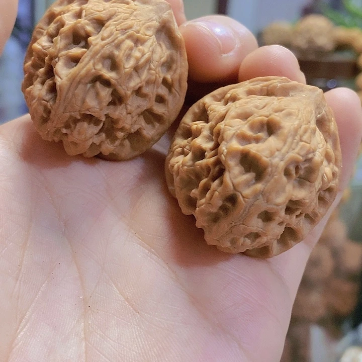 【闪购商品】文玩核桃把件40玉枕元宝黄