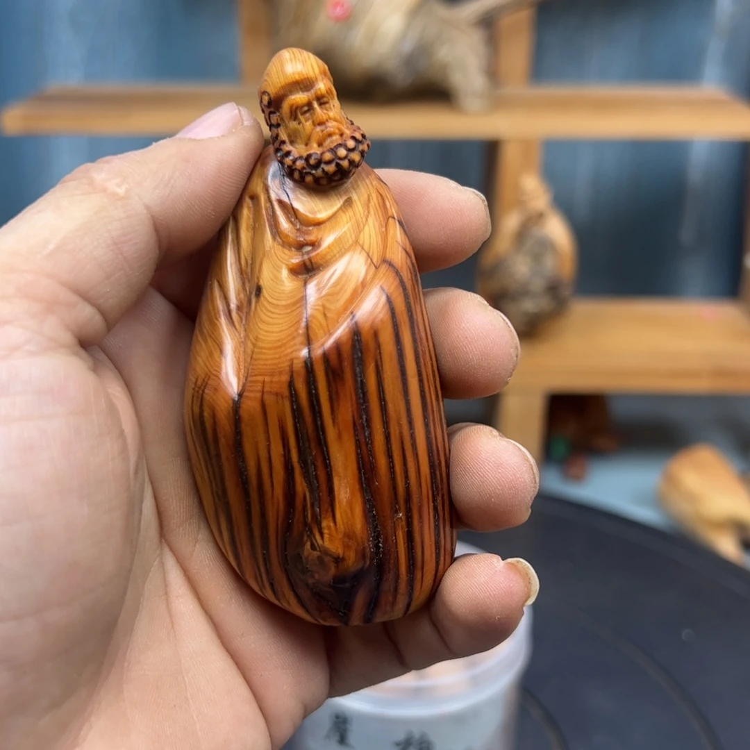木小****王崖柏木摆件手把件