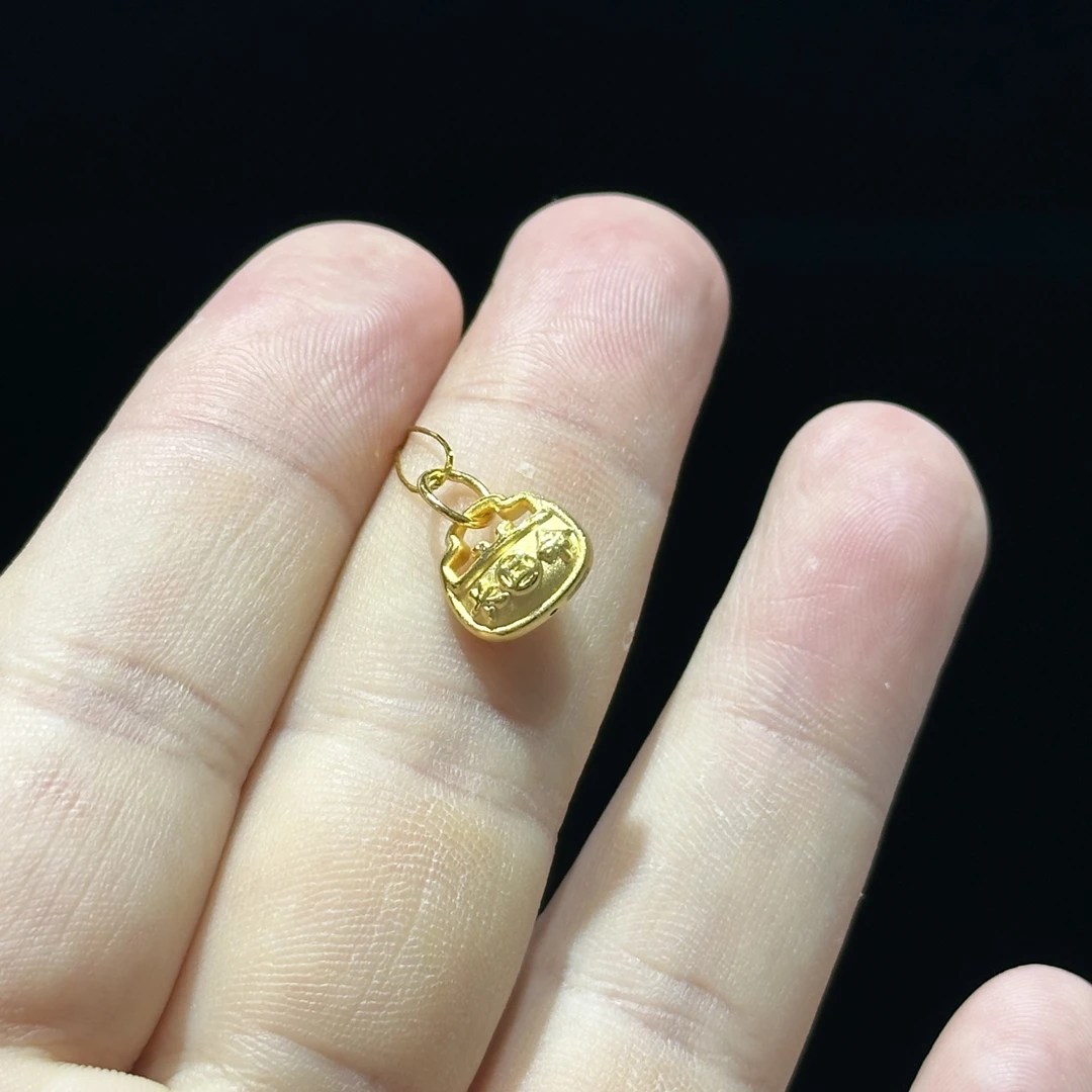 足金999 精品 长命富贵小锁滴流 0.797