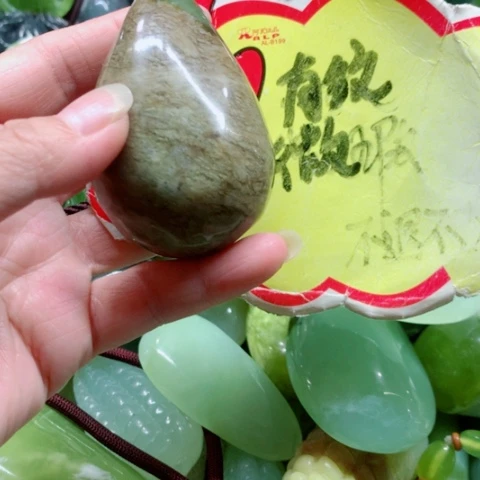 未镶嵌蛇纹石玉手把件