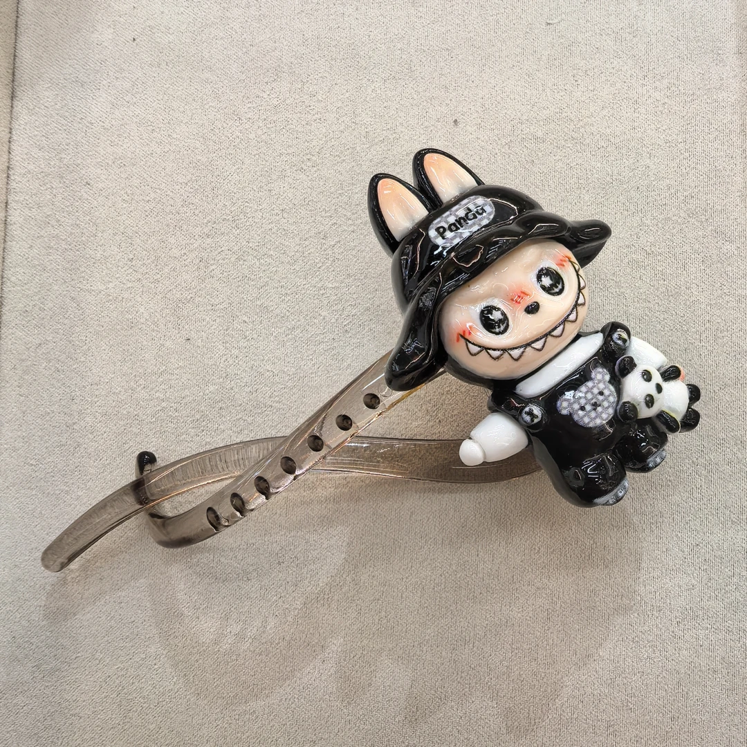 F656黑色卡通扭扭夹