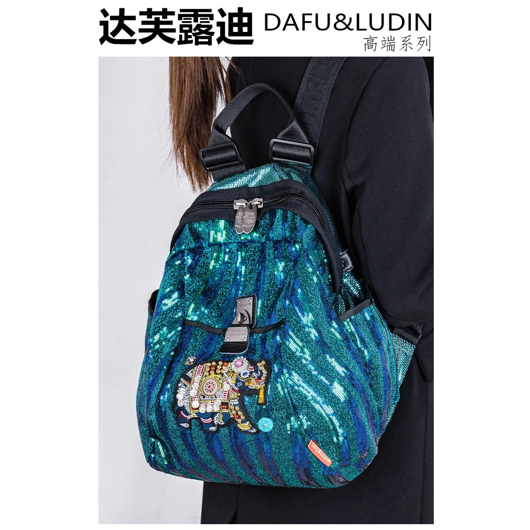 达芙露迪2026春季新款高级烫钻轻便不闷热休闲大容量时尚女双肩包