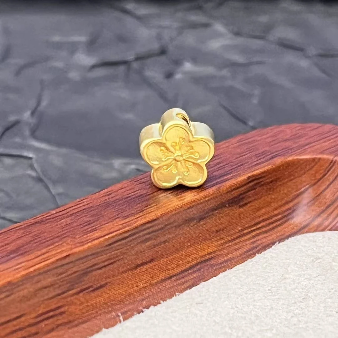 君潮黄金足金999黄金11mm桃花通孔编绳款DP1301