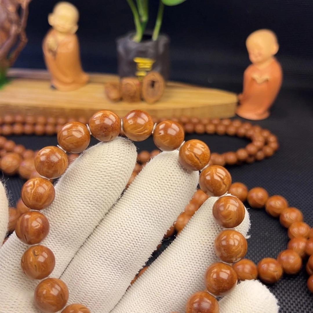 人***想野生龙纹桃核光珠