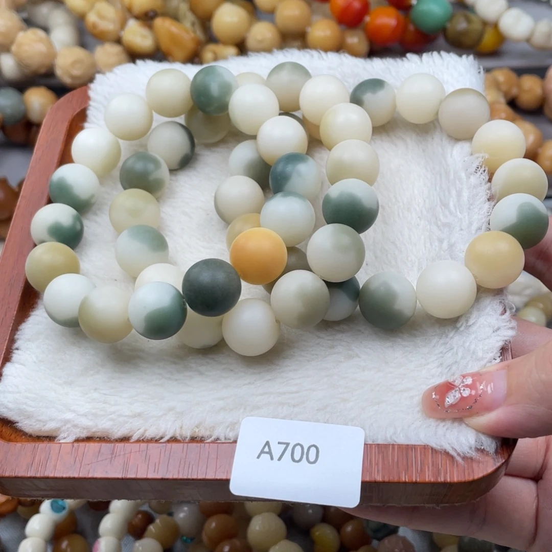 菩提根/象牙果手串瑕A700磨砂圆珠手串随机一串14mm