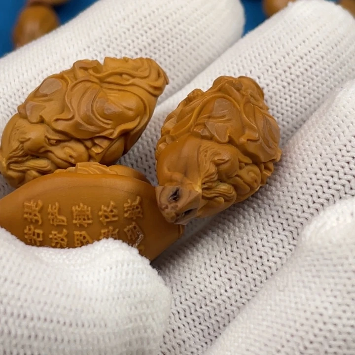 到***高橄榄核手串闪电购2