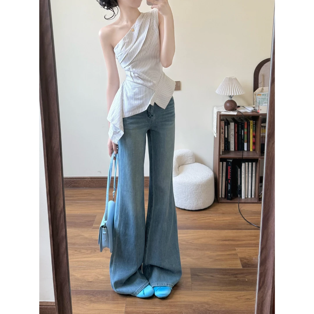 高级感时尚气质斜肩吊带上衣女夏纯欲性感辣妹高腰微喇牛仔裤套装