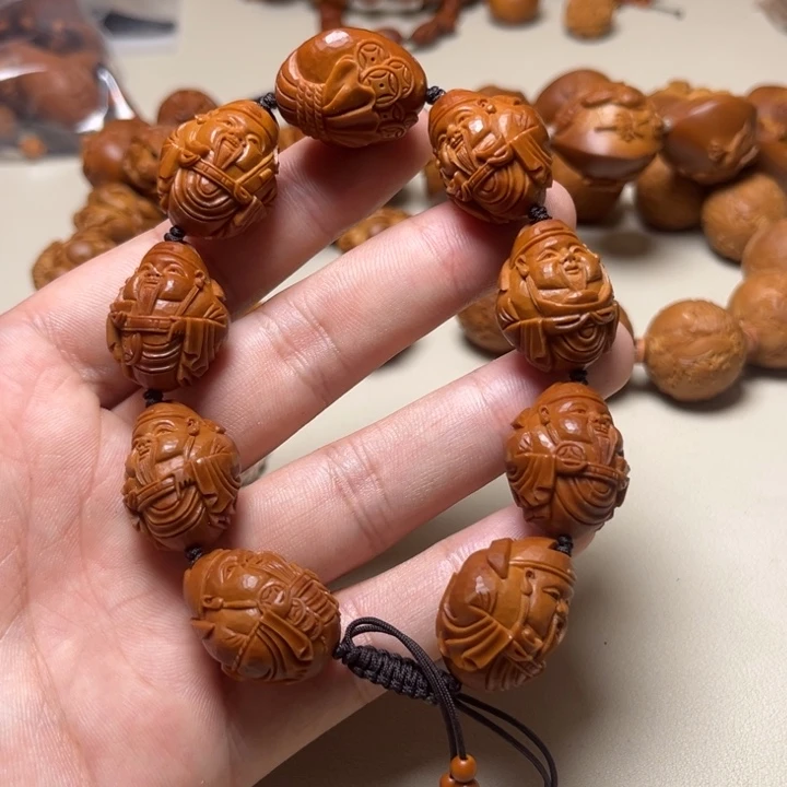 頑***闆橄榄核手串整身财神