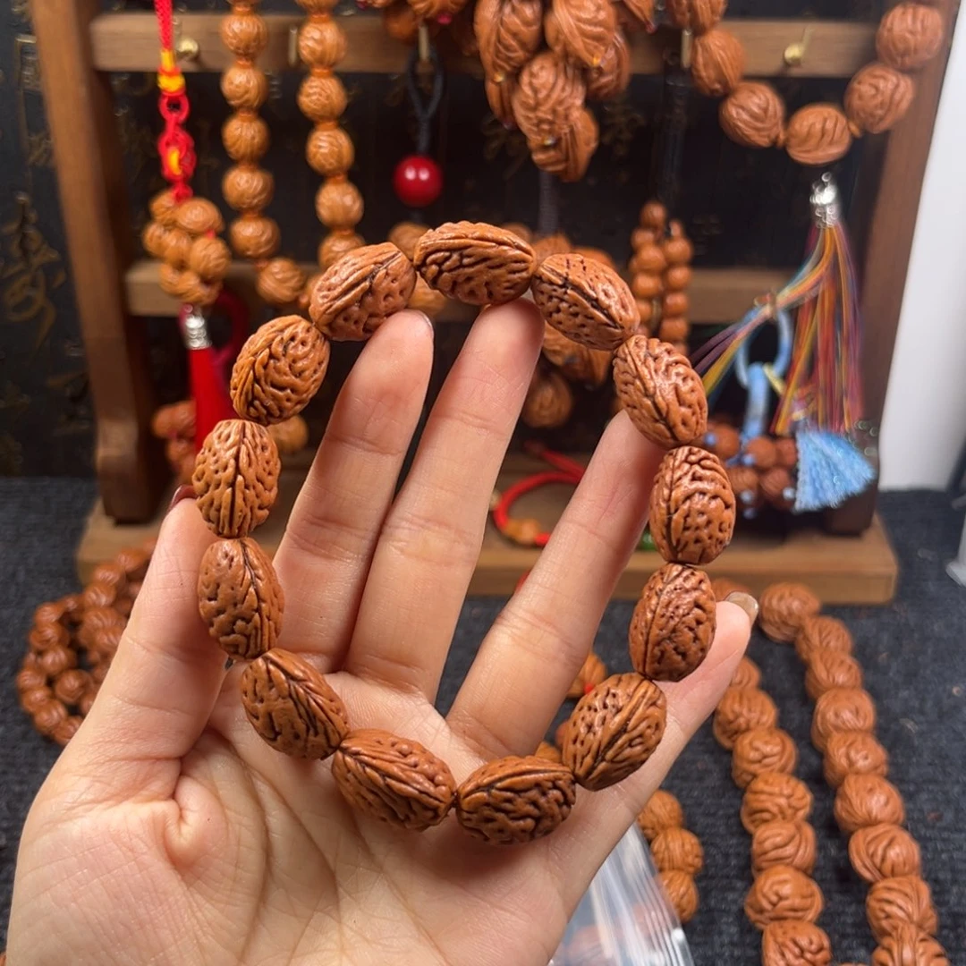 云***线吊坠桃核桃枭手串L2